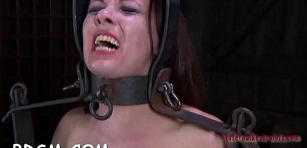  Clamped up chick gets a hook in her anal with toy punishment